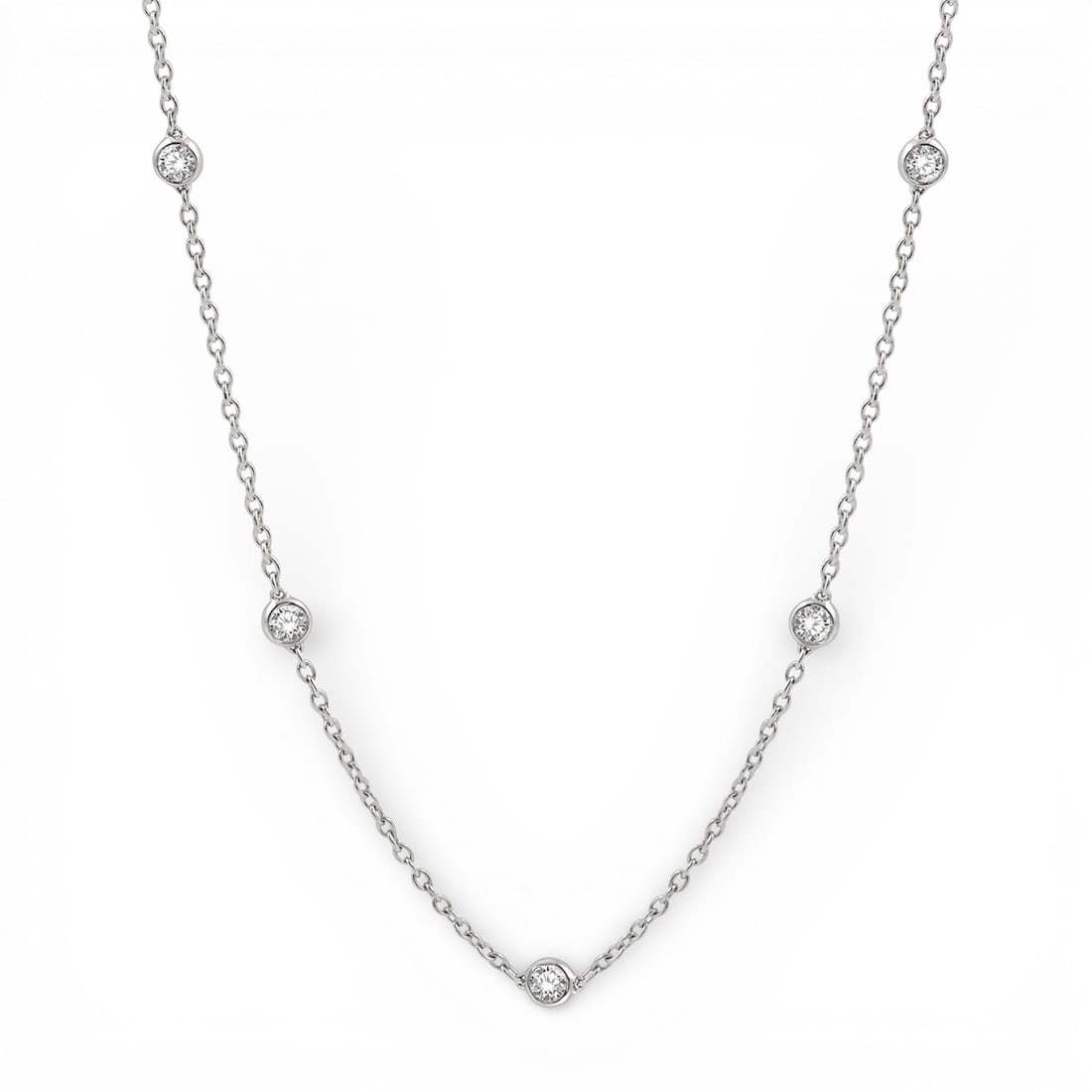 1.0 ctw White Diamond Station 14K White Gold Necklace: A vision of luxury, this elegant Station necklace featuring Natural Diamonds defines sophistication. The gemstones are nestled within a Station framework, supported by a substantial 2.85 grams 14K Whi