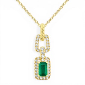 5x3mm Emerald and 0.16 ctw Diamond 14K Yellow Gold Pendant