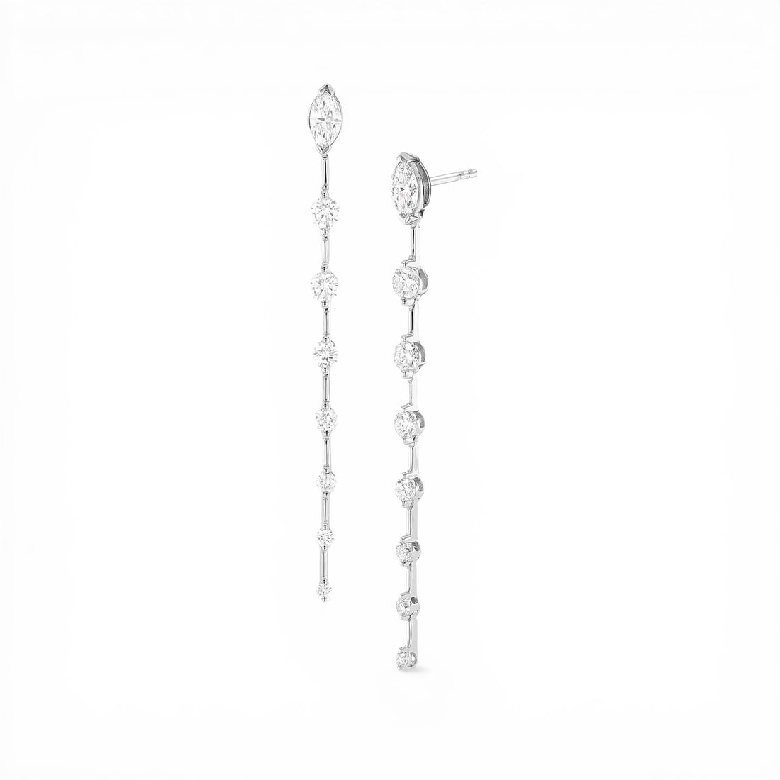 1.07 ctw Marquise & Round Diamond Drop 18k White Gold Earrings: Retail Value: $6,165 Timeless and sophisticated, this magnificent Bar Drop pair of earrings featuring White Diamond radiates enduring beauty. A detailed Drop gallery secures the stones, rendered in 2.