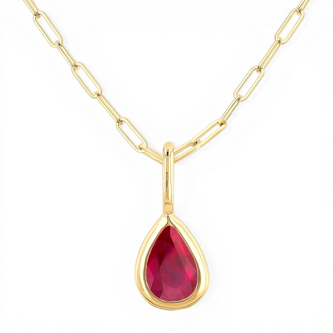 6x4mm Pear Cut Ruby Bezel 14K Yellow Gold Pendant Necklace w/ Chain: Exuding opulence and grace, this elegant Bezel Set pendant featuring Ruby is crafted for the distinguished. Crafted with precision, the Solitaire Bezel setting is seamlessly integrated into 0.4 grams 