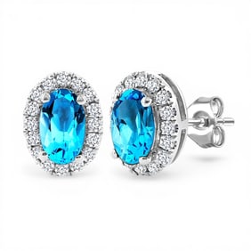 5x3mm Blue Topaz and 0.14 ctw Diamond 14K White Gold Stud Earrings