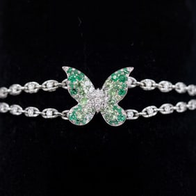 1.40 ctw Emerald and 0.45ct Diamond Platinum Bracelet