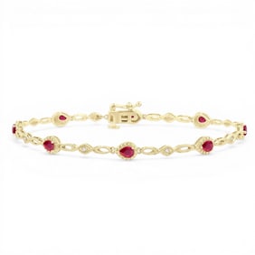 4x3mm Pear Ruby and 0.05 ctw Diamond 10K Yellow Gold Bracelet