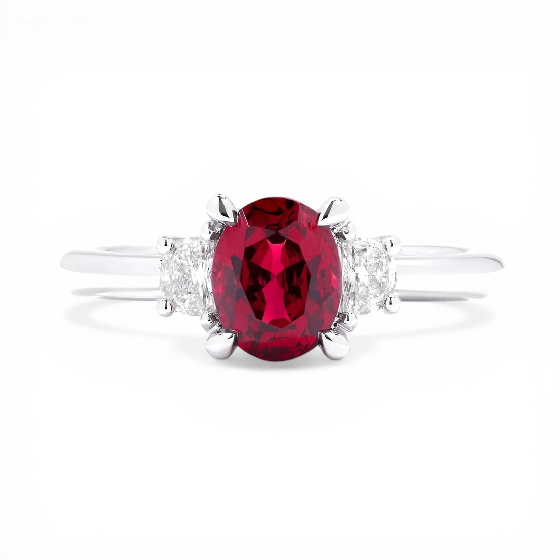 Oval Ruby and 0.27 ctw White Diamond Platinum Ring: Retail Value: $26,385 Epitomizing grandeur, this magnificent Three-Stone ring featuring Ruby, White Diamond stands as a beacon of refined taste. The gemstones are nestled within a Three-Stone framewor