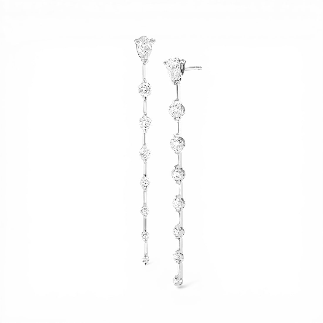 1.09 ctw Diamond Drop 18K White Gold Earrings: Retail Value: $5,865 A vision of luxury, this exquisite Bar Pear And Round Drop pair of earrings featuring White Diamond defines sophistication. Securely held in a classic Drop/Dangle design, the earr