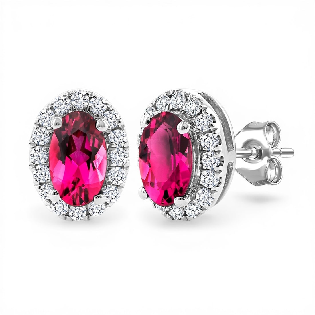 5x3mm Pink Tourmaline and 0.14 ctw Diamond 14K White Gold Stud Earrings: Timeless and sophisticated, this elegant Halo pair of earrings featuring Pink Tourmaline, White Diamond radiates enduring beauty. Expertly mounted in a Halo setting, the earrings are crafted in 0.85 g
