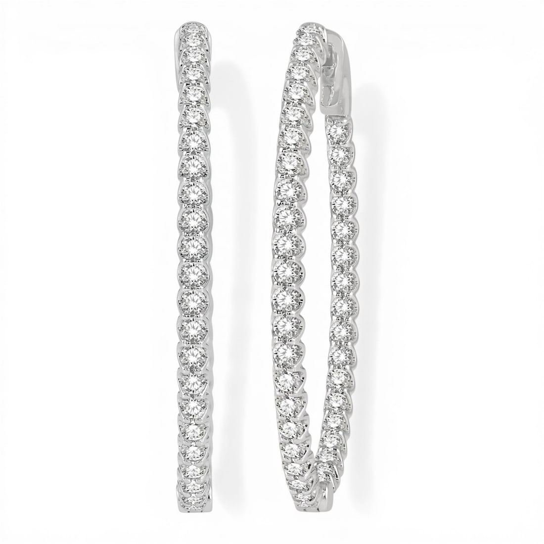 1.52 ctw Inside-Out Diamond Hoop 14K White Gold Earrings: Timeless and sophisticated, this elegant Oval Shape Hoop pair of earrings featuring Natural Diamonds radiates enduring beauty. The gemstones are nestled within a Hoop framework, supported by a substan