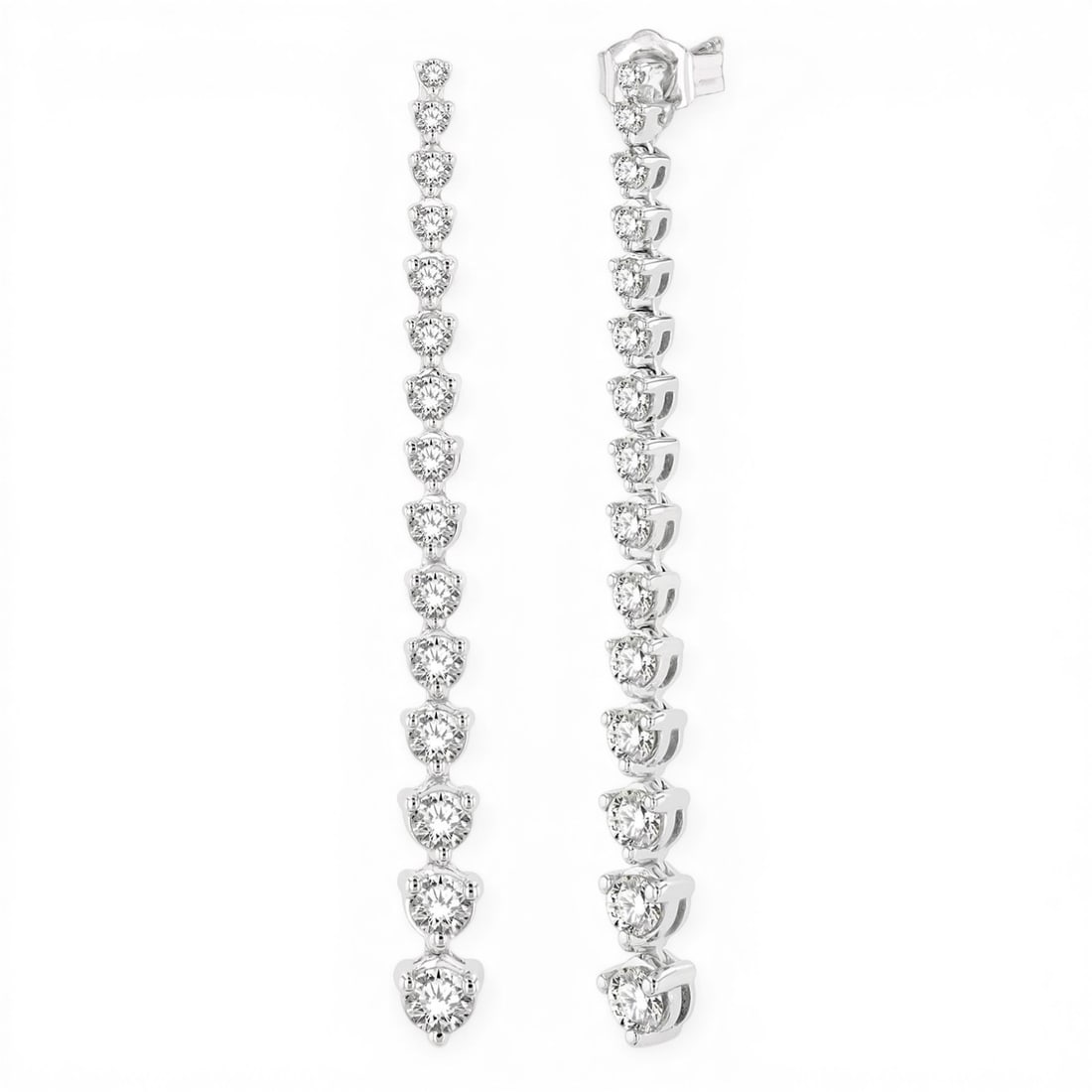 2.02 ctw Round Diamond Riviera Drop 14K White Gold Earrings: An exquisite masterpiece of haute joaillerie, this breathtaking Riviera Drop pair of earrings featuring Natural Diamonds is a true treasure. Showcasing the gems in a Drop arrangement, the earrings con