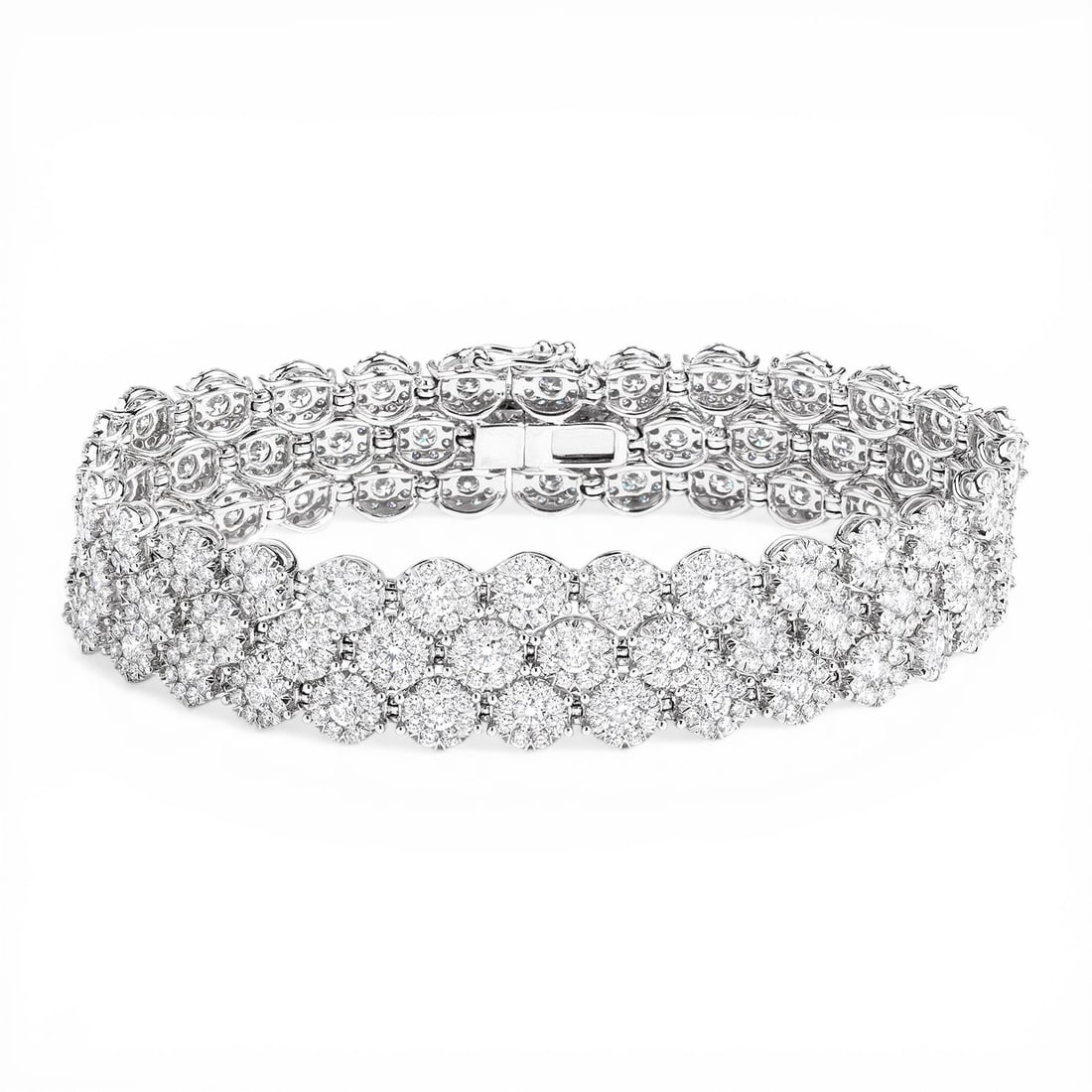 12.94 ctw Round White Diamond Three-Row Tennis Bracelet 18K White Gold: Retail Value: $66,255 Timeless and sophisticated, this magnificent Three-Row tennis bracelet featuring White Diamond radiates enduring beauty. Crafted with precision, the Cluster setting is seamlessly