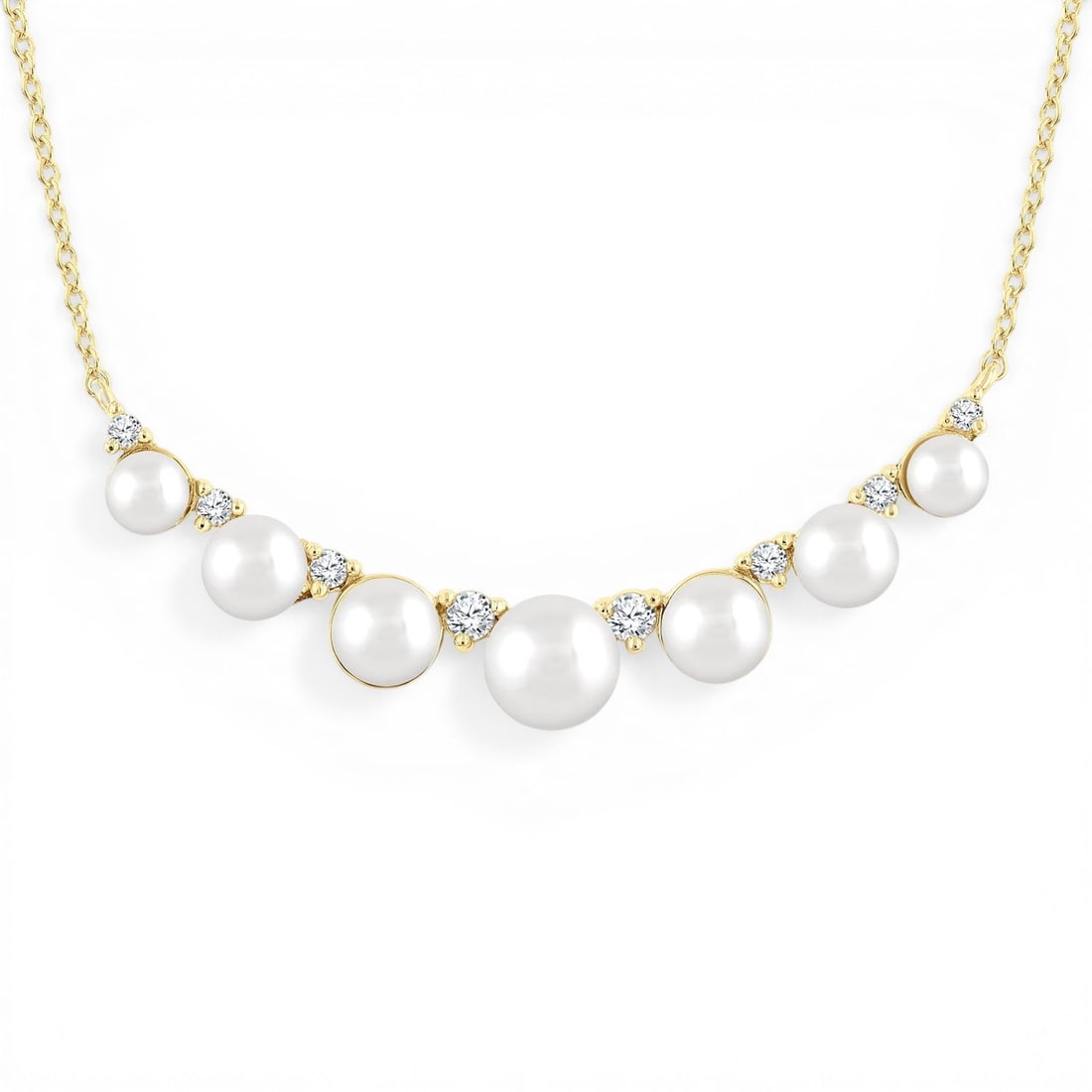 3.5mm-5mm Cultured Pearl and 0.14 ctw Diamond 10K Yellow Gold Necklace: Rare and radiant, this elegant Smile necklace featuring Cultured Pearl, White Diamond offers a touch of the extraordinary. A detailed Bar gallery secures the stones, rendered in 1.6 grams of lustrous 