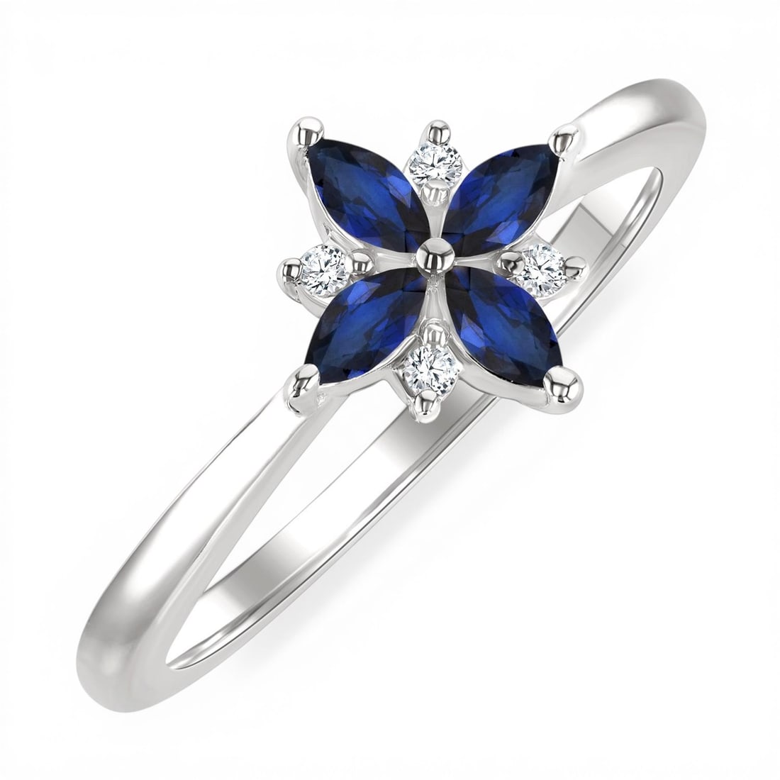 4x2mm Blue Sapphire and 0.04 ctw Diamond 10K White Gold Ring: Exuding opulence and grace, this elegant Floral Blossom ring featuring Blue Sapphire, White Diamond is crafted for the distinguished. Crafted with precision, the Cluster setting is seamlessly integrat
