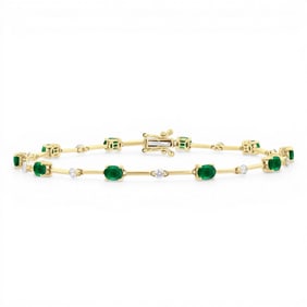 4x3mm Oval Emerald and 0.32 ctw Diamond 10K Yellow Gold Bracelet