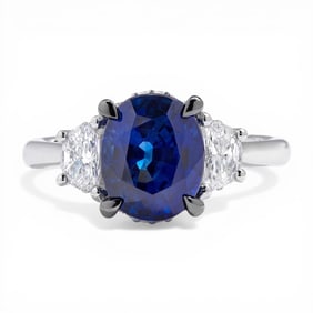 Three Stone Blue Sapphire and 0.63 ctw Diamond Platinum Ring