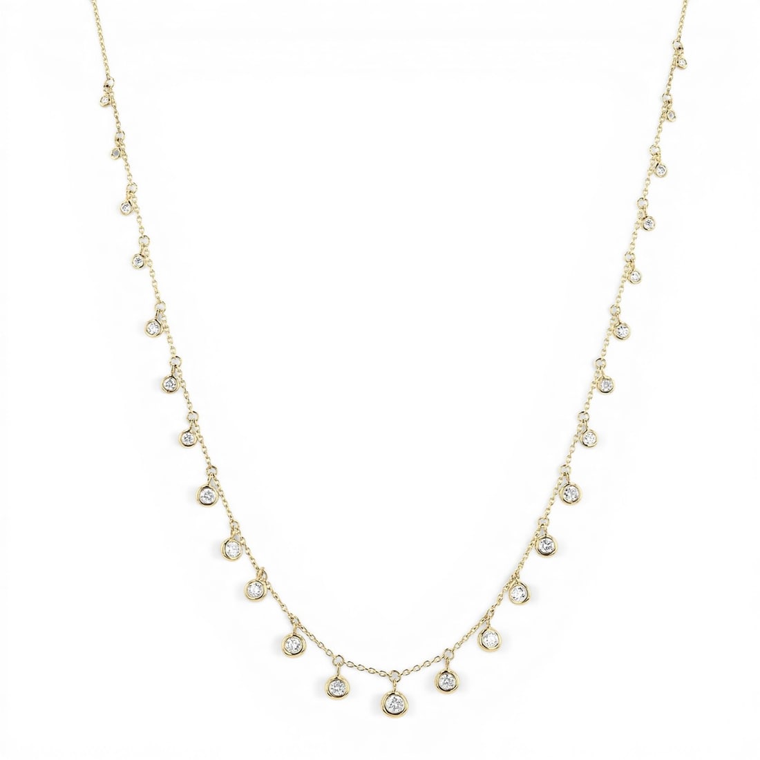 0.59 ctw Round Diamond Bezel Set Station 14K Yellow Gold Necklace: Epitomizing grandeur, this elegant Station necklace featuring White Diamond stands as a beacon of refined taste. Showcasing the gems in a Station arrangement, the necklace consists of 3.4 g of 14K Yel