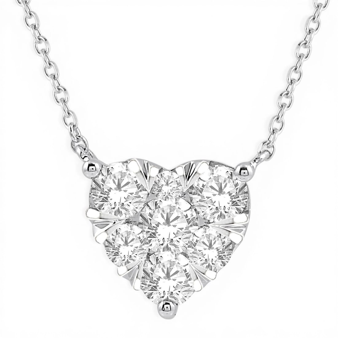 1.01 ctw Diamond Cluster Heart 14K White Gold Pendant Necklace: Captured in a moment of brilliance, this exquisite Cluster Heart necklace featuring White Diamond speaks to the connoisseur. Expertly mounted in a Cluster setting, the necklace is crafted in 1.0 grams