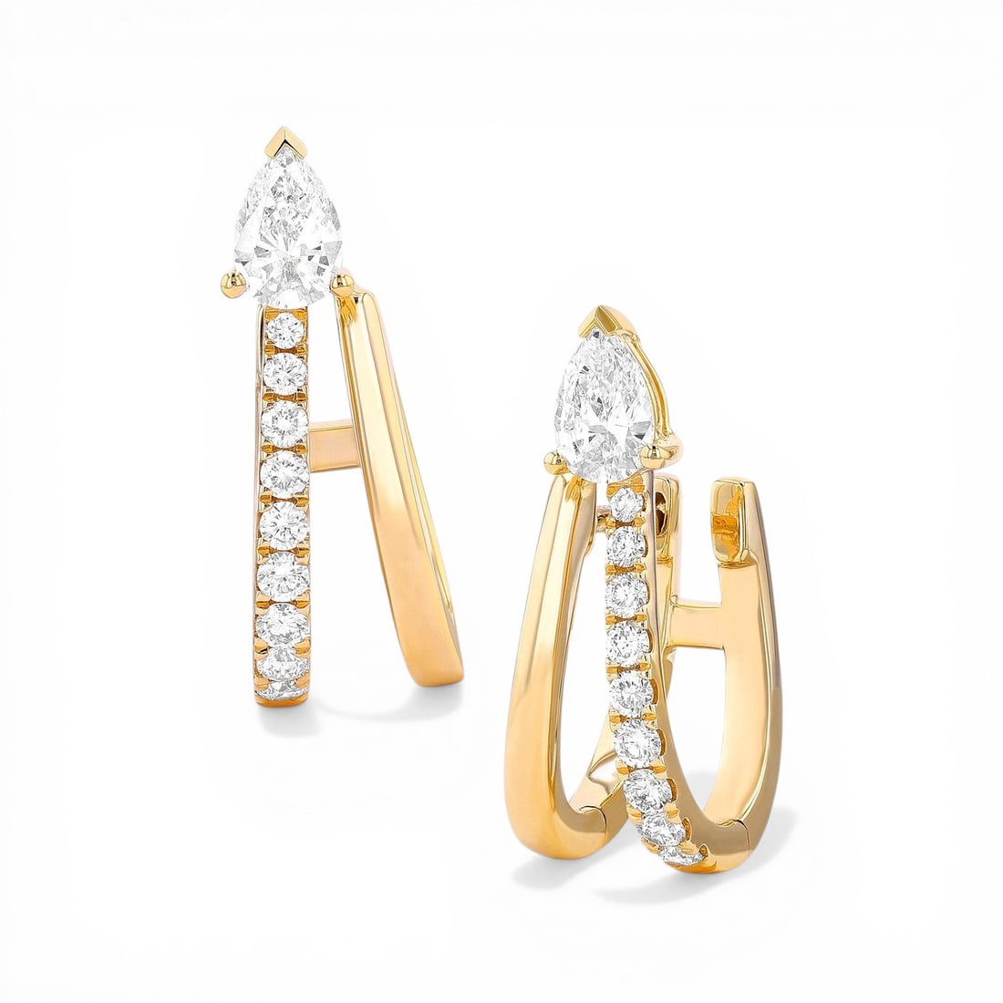 0.60 ctw Paradox Pear Diamond 18K Yellow Gold Earrings: Retail Value: $5,310 Exuding opulence and grace, this stunning Paradox Pear pair of earrings featuring White Diamond is crafted for the distinguished. A detailed Double Half Hoop gallery secures the s