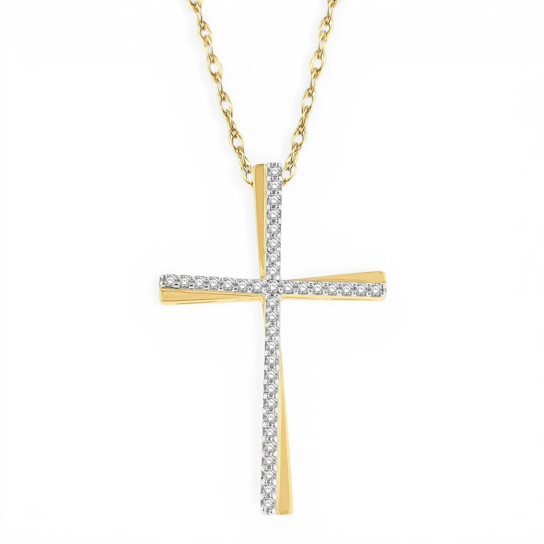 0.15 ctw White Diamond Cross Pendant 10K Yellow Gold: A symphony of light and color, this exquisite Cross pendant featuring White Diamond embodies the pinnacle of luxury. Expertly mounted in a Line Setting setting, the pendant is crafted in 1.6 grams of 