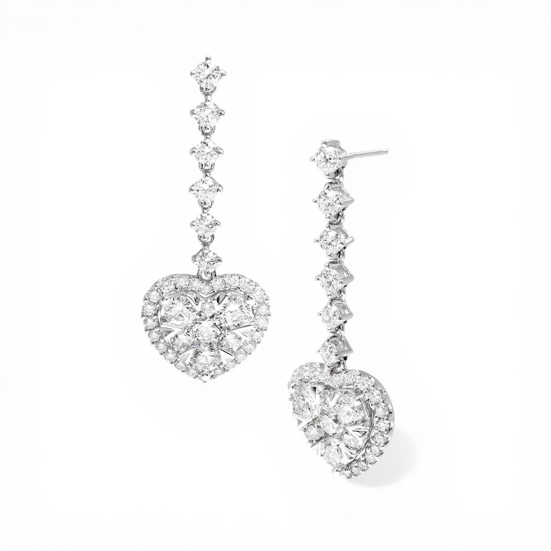3.82 ctw White Diamond Heart Drop Cluster 18K White Gold Earrings: An exquisite masterpiece of haute joaillerie, this breathtaking Heart Drop Cluster pair of earrings featuring White Diamond is a true treasure. Showcasing the gems in a Halo arrangement, the earrings 