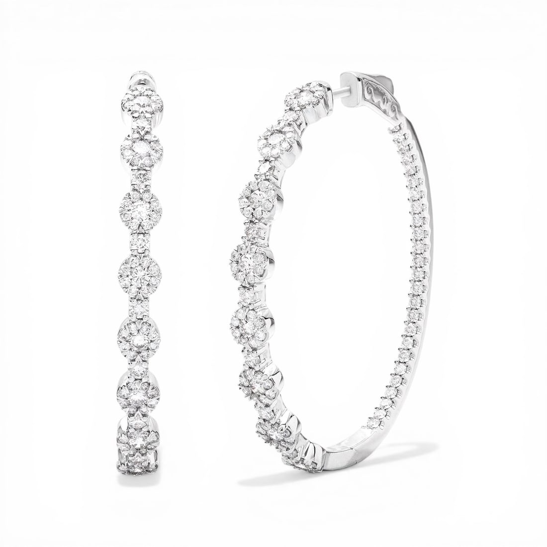 2.05 ctw Fiori Cluster White Diamond 18K White Gold Hoop Earrings: Timeless and sophisticated, this stunning Fiori Station Cluster pair of earrings featuring White Diamond radiates enduring beauty. Expertly mounted in a Cluster setting, the earrings are crafted in 12