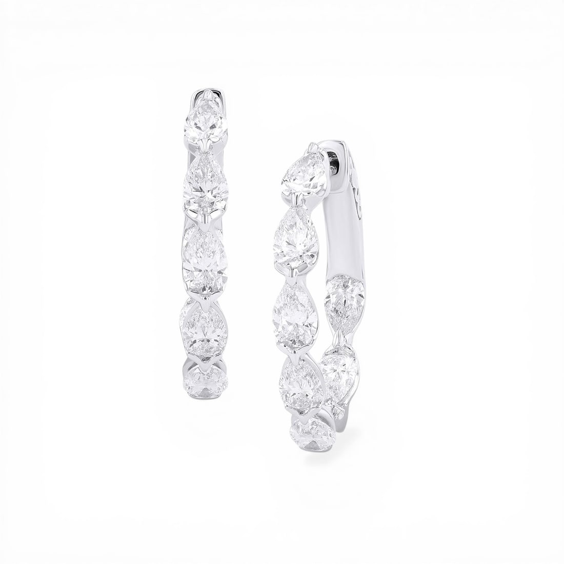 Duchess 2.56 ctw Pear Diamond 18K White Gold Hoop Earrings: Rare and radiant, this stunning Pear Hoops pair of earrings featuring White Diamond offers a touch of the extraordinary. Showcasing the gems in a Continuous Line arrangement, the earrings consists of 