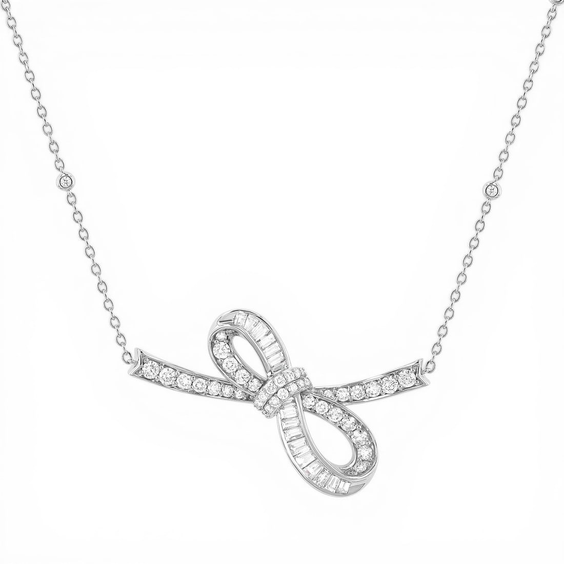 1.96 ctw Baguette & Round Diamond Bow Smile 18K White Gold Pendant Necklace: A vision of luxury, this breathtaking Bow Smile pendant necklace featuring White Diamond defines sophistication. The gemstones are nestled within a Pave/Channel Setting framework, supported by a subst