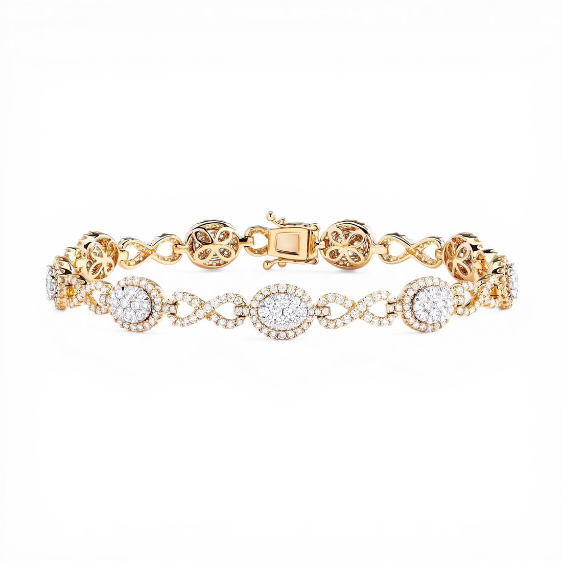 3.06 ctw Diamond Fiori Oval And Infinity Alternating 18K Yellow & White Gold Bracelet: An exquisite masterpiece of haute joaillerie, this stunning Fiori Oval And Infinity Alternating bracelet featuring Natural Diamonds is a true treasure. A detailed Alternating Link/Halo Cluster gallery