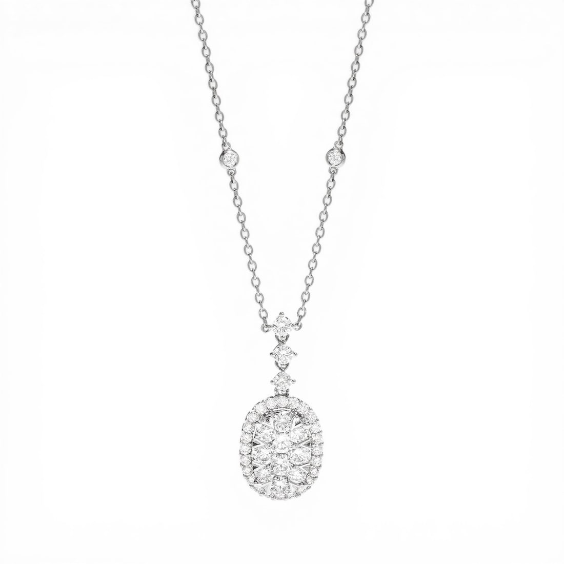 2.44 ctw White Diamond Fiori Oval Drop Cluster 18K White Gold Pendant Necklace: A vision of luxury, this stunning Fiori Oval Drop Cluster necklace featuring White Diamond defines sophistication. Expertly mounted in a Cluster setting, the necklace is crafted in 6.0 grams of solid 