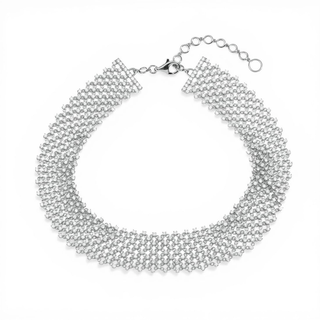 12.82 ctw White Diamond 18K White Gold Choker: A testament to superior craftsmanship, this breathtaking Silk Mesh choker featuring White Diamond is unparalleled. Showcasing the gems in a Continuous Mesh/Pave arrangement, the choker consists of 30.