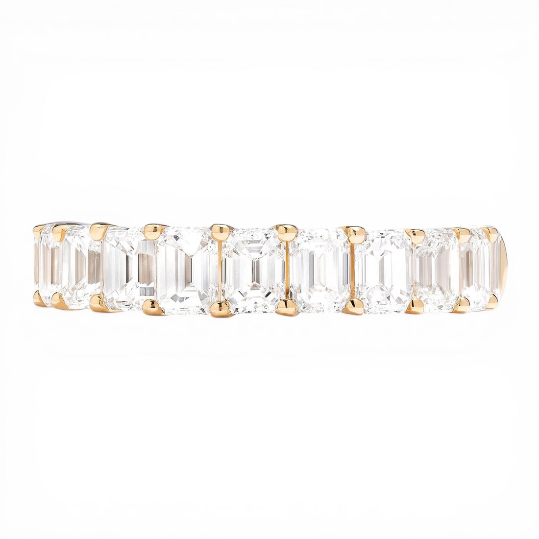 2.75 ctw Emerald Cut Diamond 18K Yellow Gold Band Ring: Epitomizing grandeur, this magnificent Duchess Halfway Band ring featuring White Diamond stands as a beacon of refined taste. Crafted with precision, the Shared Prong Band setting is seamlessly integr