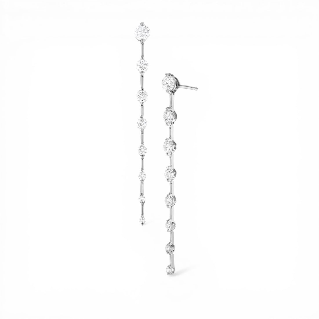 Duchess Bar 1.01 ctw White Diamond 18K White Gold Drop Earrings: Exuding opulence and grace, this stunning Bar Drop pair of earrings featuring White Diamond is crafted for the distinguished. Crafted with precision, the Drop/Dangle setting is seamlessly integrated i