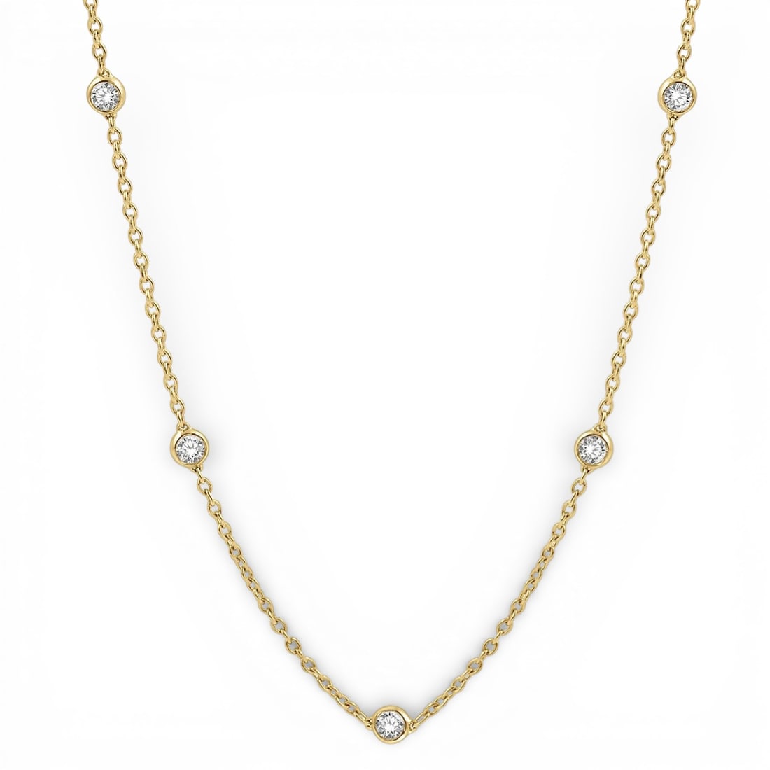 1.51 ctw Round Diamond Station 14K Yellow Gold Necklace: A symphony of light and color, this exquisite Station necklace featuring Natural Diamonds embodies the pinnacle of luxury. The gemstones are nestled within a Bezel framework, supported by a substantia