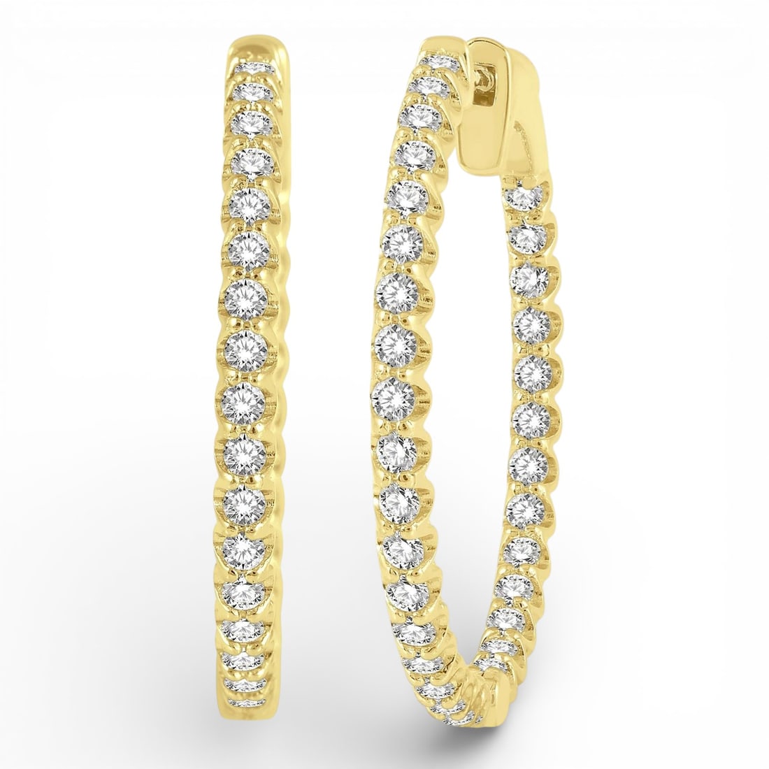 1.02 ctw Diamond 14K Yellow Gold Hoop Earrings: A vision of luxury, this stunning Inside-Out Round Cut pair of earrings featuring White Diamond defines sophistication. The gemstones are nestled within a Hoop framework, supported by a substantial 5.