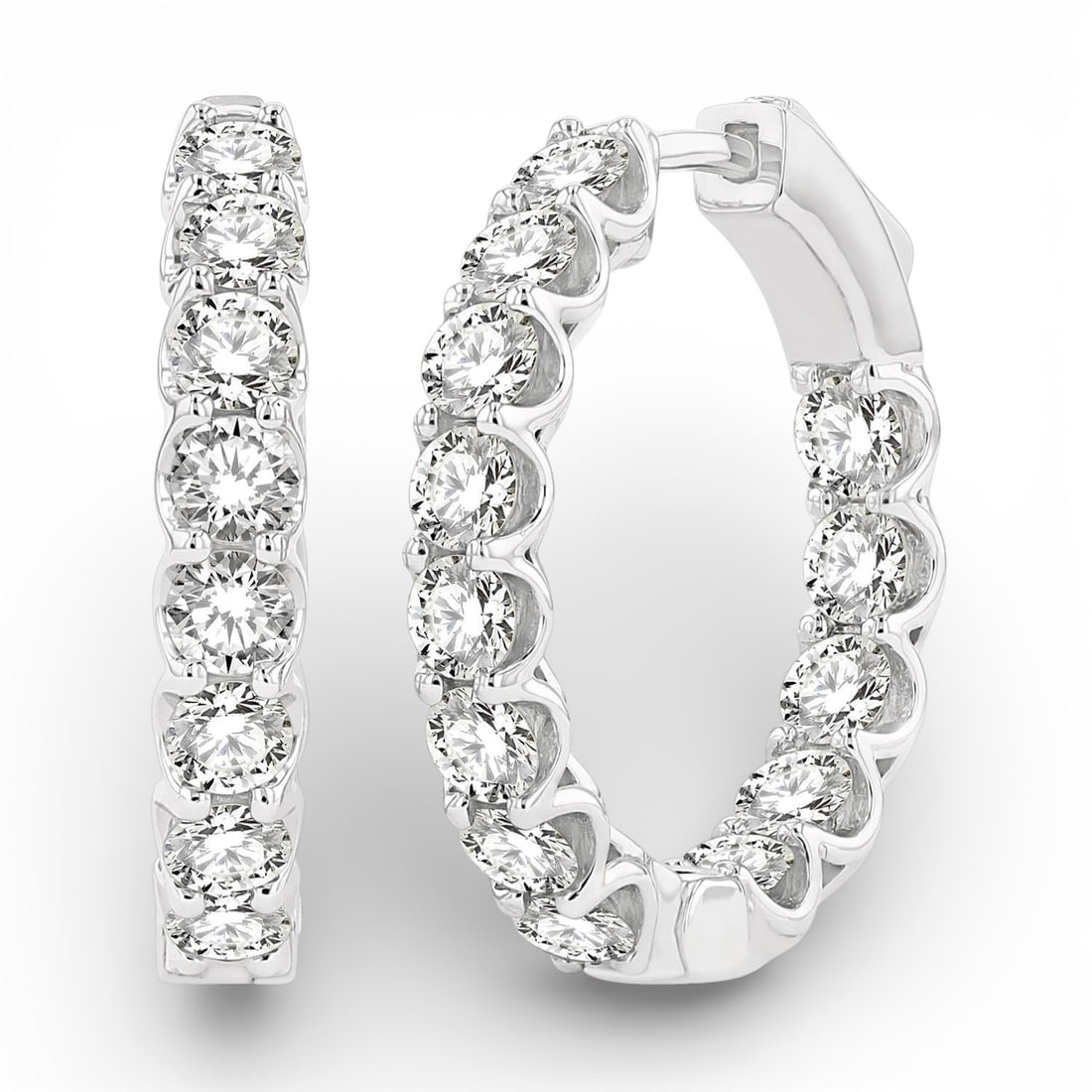 3.06 ctw Round Diamond Inside-Out 14K White Gold Hoop Earrings: Epitomizing grandeur, this stunning Inside-Out pair of earrings featuring Natural Diamonds stands as a beacon of refined taste. A detailed Continuous Line Hoop gallery secures the stones, rendered in 