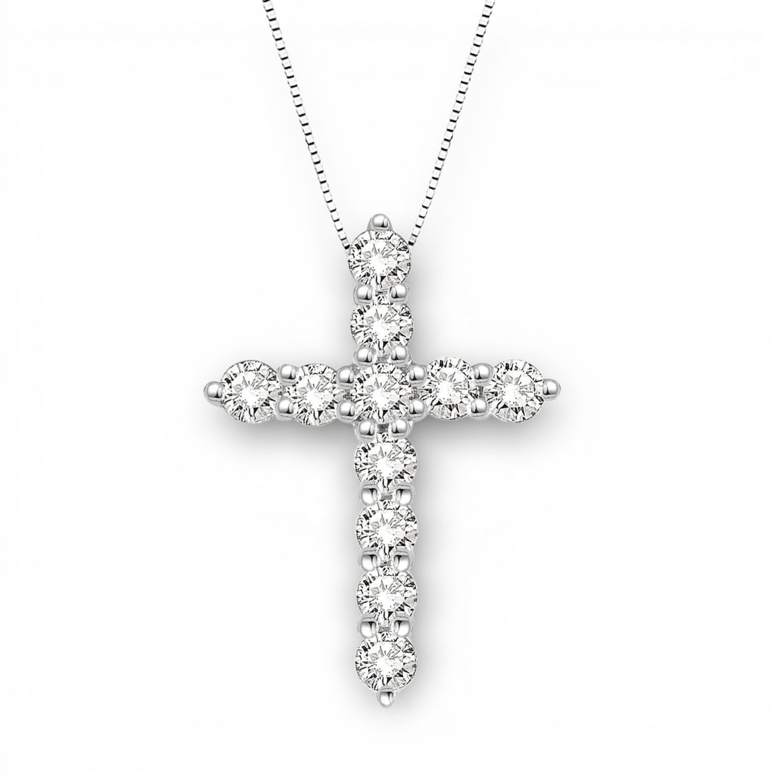 0.50 ctw Diamond Cross Pendant 14K White Gold: A vision of luxury, this elegant Cross pendant featuring White Diamond defines sophistication. Expertly mounted in a Prong setting, the pendant is crafted in 0.5 grams of solid 14K White Gold. This pe