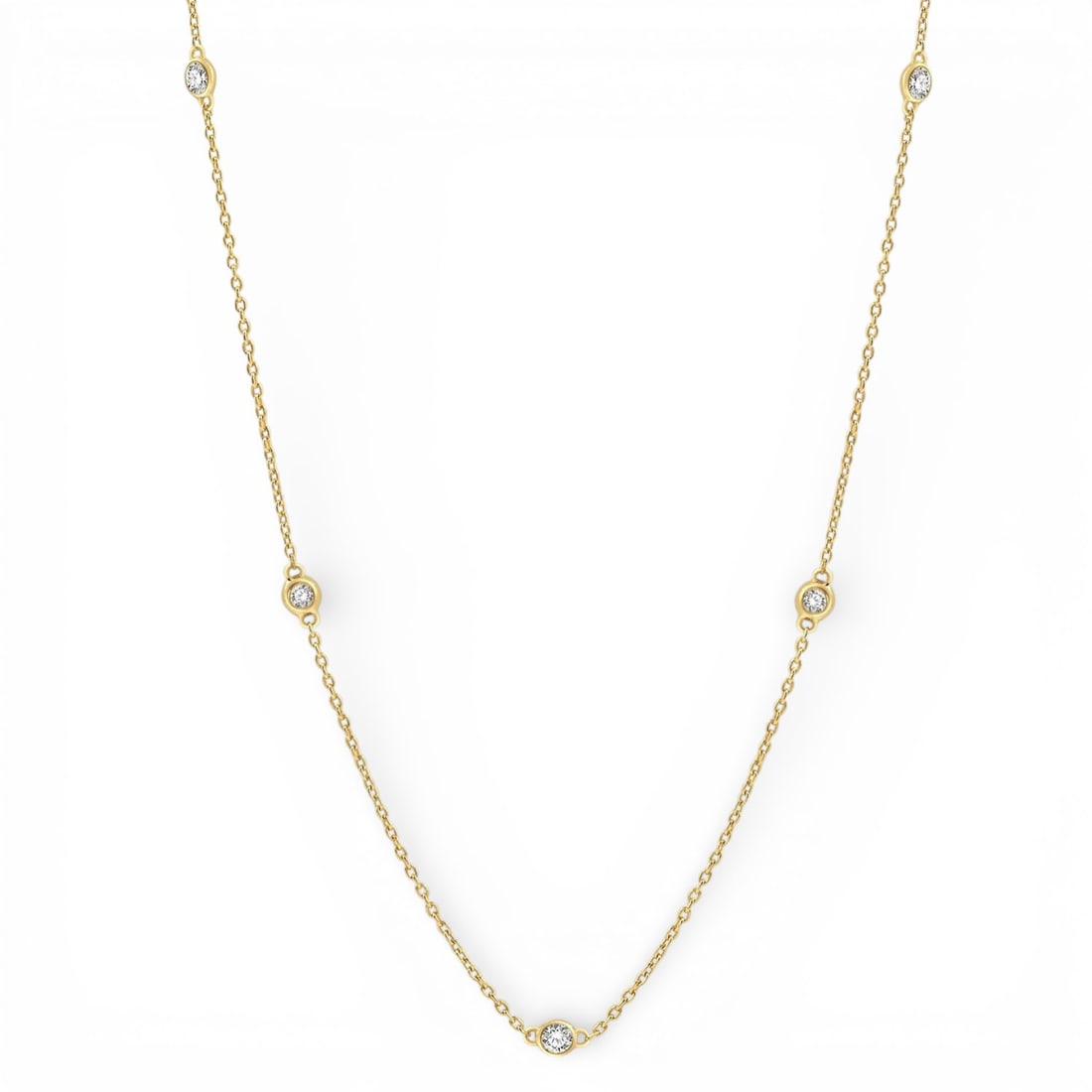 0.5 ctw Diamond Station 14K Yellow Gold Necklace: Exuding opulence and grace, this elegant Station necklace featuring White Diamond is crafted for the distinguished. Showcasing the gems in a Station arrangement, the necklace consists of 2.0 grams of 