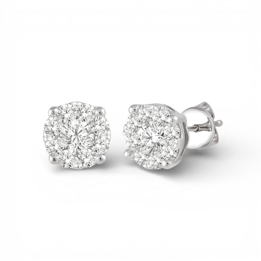 0.34 ctw Diamond Cluster 14K White Gold Stud Earrings: Defining modern elegance, this stunning Cluster pair of earrings featuring Natural Diamonds captures the essence of style. Securely held in a classic Cluster design, the earrings are forged from 1.55 