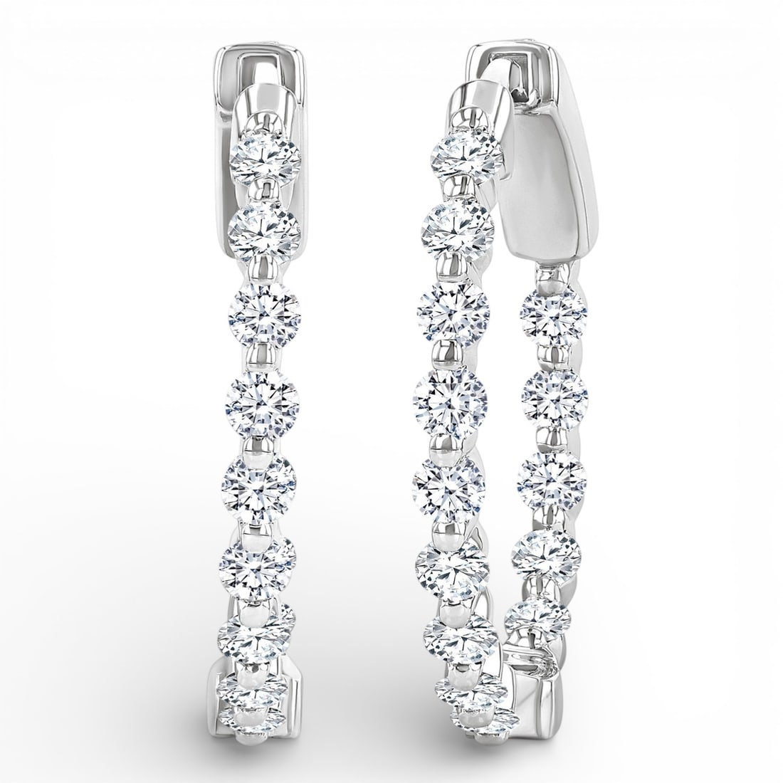 1.02 ctw Diamond Inside-Out Hoop 14K White Gold Earrings: Defining modern elegance, this elegant Inside-Out Hoop pair of earrings featuring White Diamond captures the essence of style. Securely held in a classic Continuous Line design, the earrings are forge