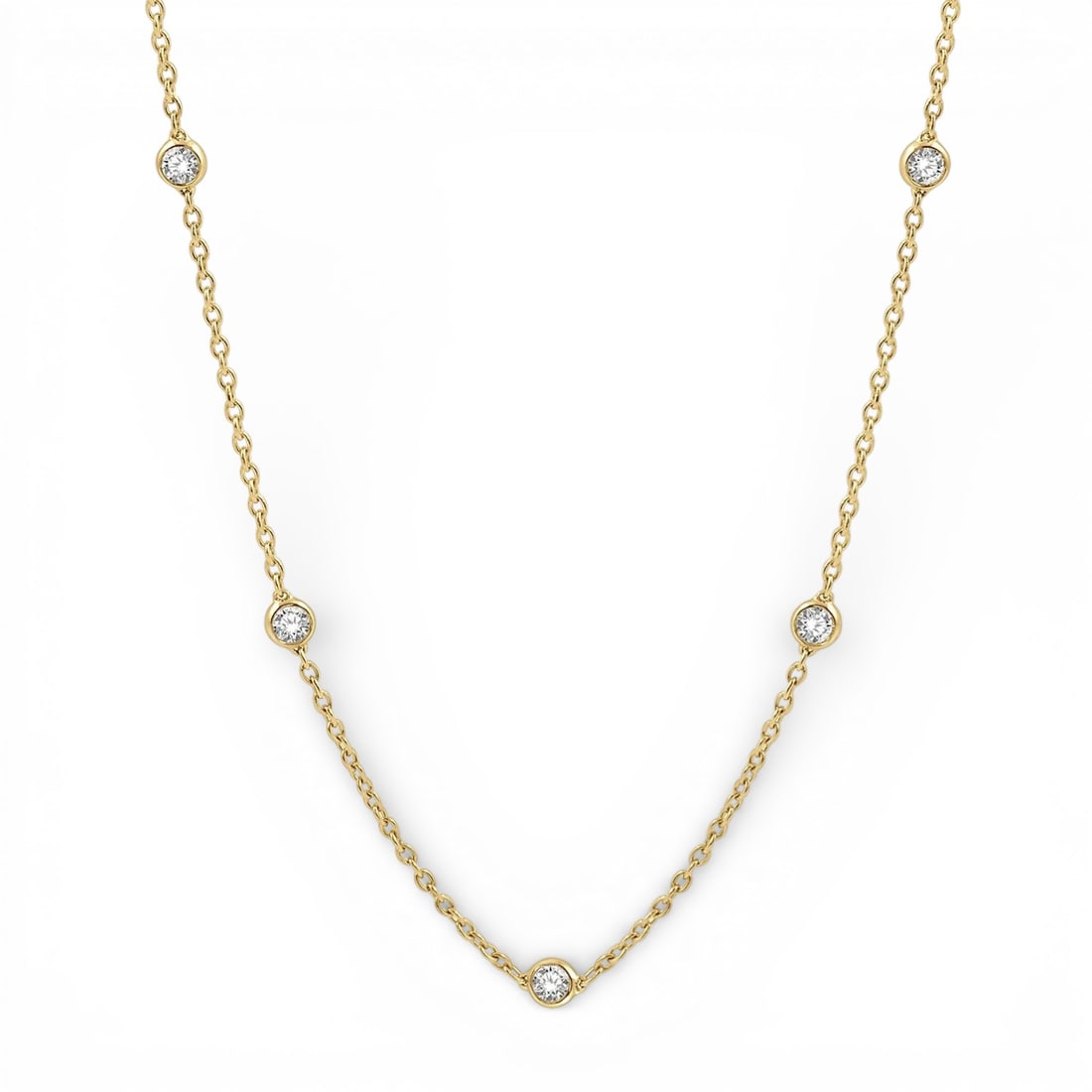 1.0 ctw Diamond Station 14K Yellow Gold Necklace: A vision of luxury, this elegant Station necklace featuring Natural Diamonds defines sophistication. Securely held in a classic Station design, the necklace is forged from 2.85 grams of high-polish 14