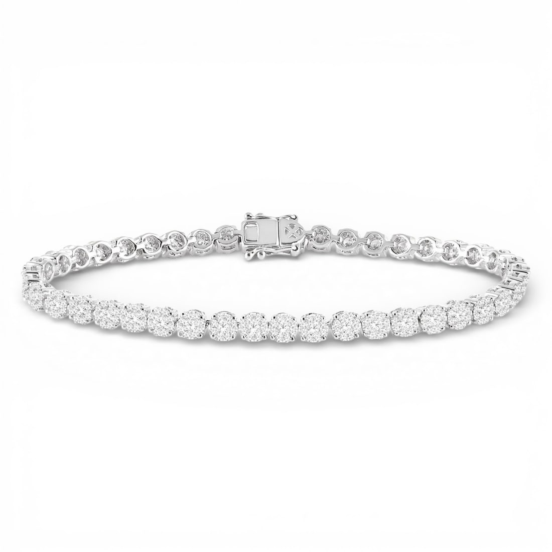 3.01 ctw Cluster Diamond Tennis Bracelet 14K White Gold: Defining modern elegance, this breathtaking Cluster bracelet featuring White Diamond captures the essence of style. The gemstones are nestled within a Cluster framework, supported by a substantial 11.