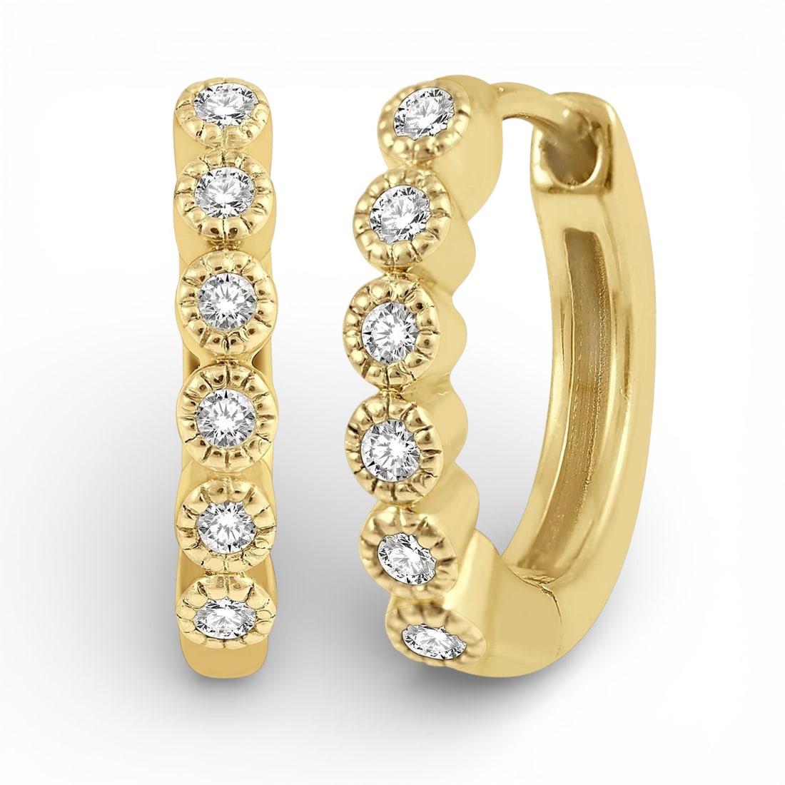 0.10 ctw Diamond Petite Huggie Earrings 10K Yellow Gold: Exuding opulence and grace, this elegant Huggie pair of earrings featuring Natural Diamonds is crafted for the distinguished. A detailed Huggie Hoop gallery secures the stones, rendered in 1.7 grams o