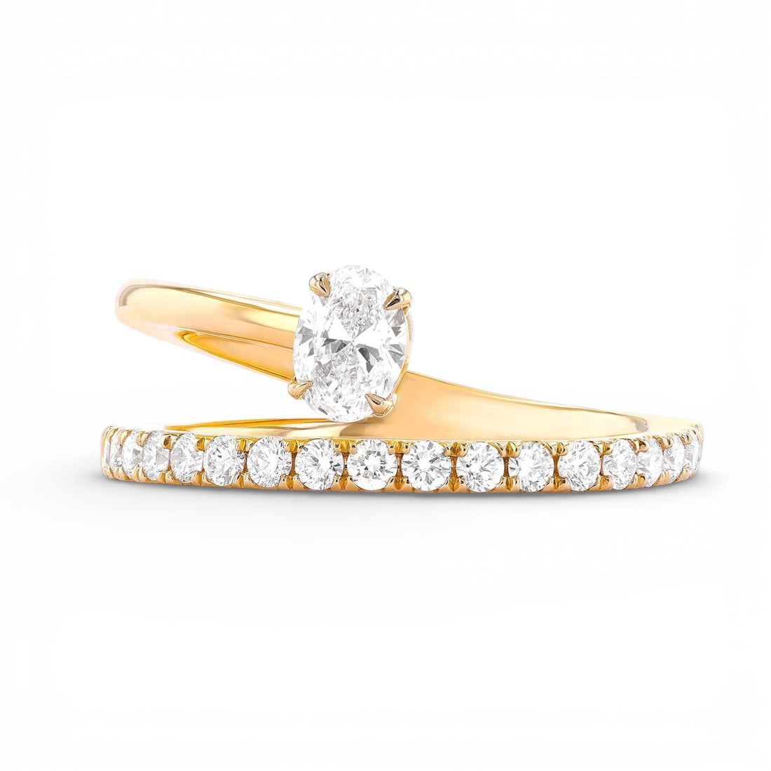 0.68 ctw Diamond Paradox Oval Open 18K Yellow Gold Ring: An exquisite masterpiece of haute joaillerie, this magnificent Paradox Oval Open ring featuring White Diamond is a true treasure. Showcasing the gems in a Bypass arrangement, the ring consists of 4.15