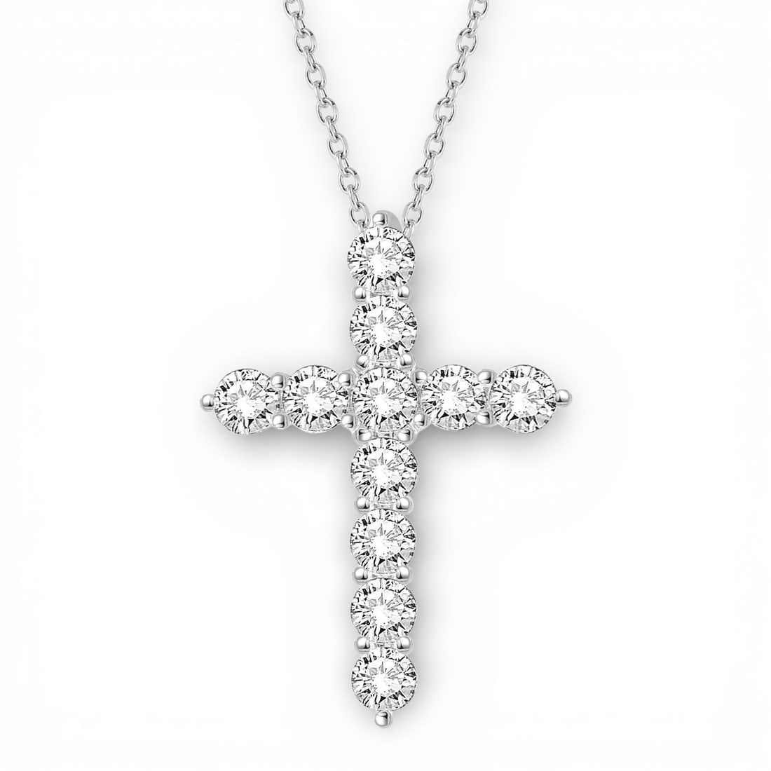 2.04 ctw Round Cut Diamond Cross 14K White Gold Pendant: Defining modern elegance, this elegant Cross pendant featuring White Diamond captures the essence of style. Securely held in a classic Line Setting design, the pendant is forged from 1.65 grams of hig