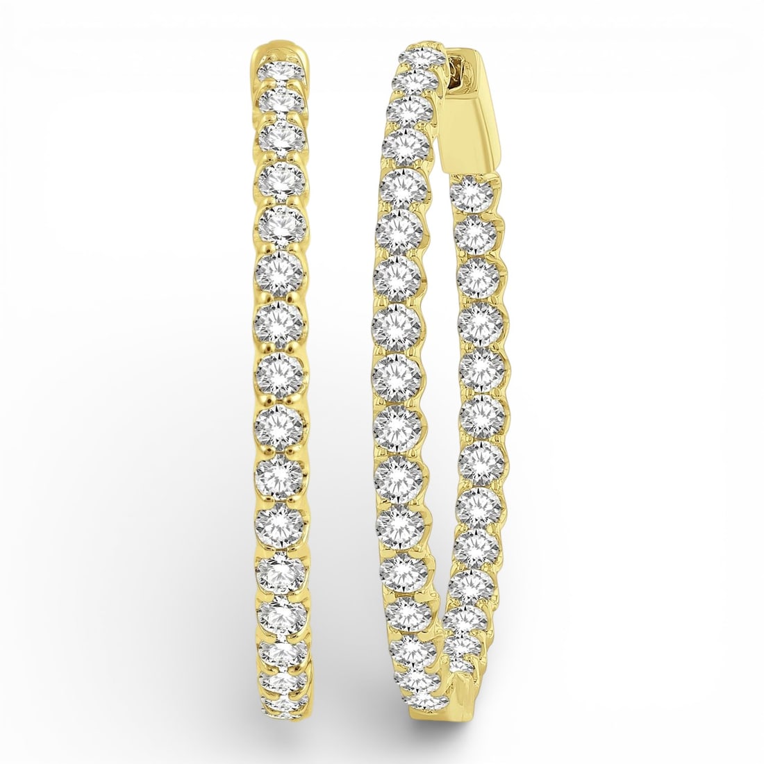 3.00 ctw Inside-Out Oval Diamond 14K Yellow Gold Hoop Earrings: Rare and radiant, this stunning Inside-Out Oval Shape pair of earrings featuring White Diamond offers a touch of the extraordinary. Showcasing the gems in a Line/Riviera arrangement, the earrings cons