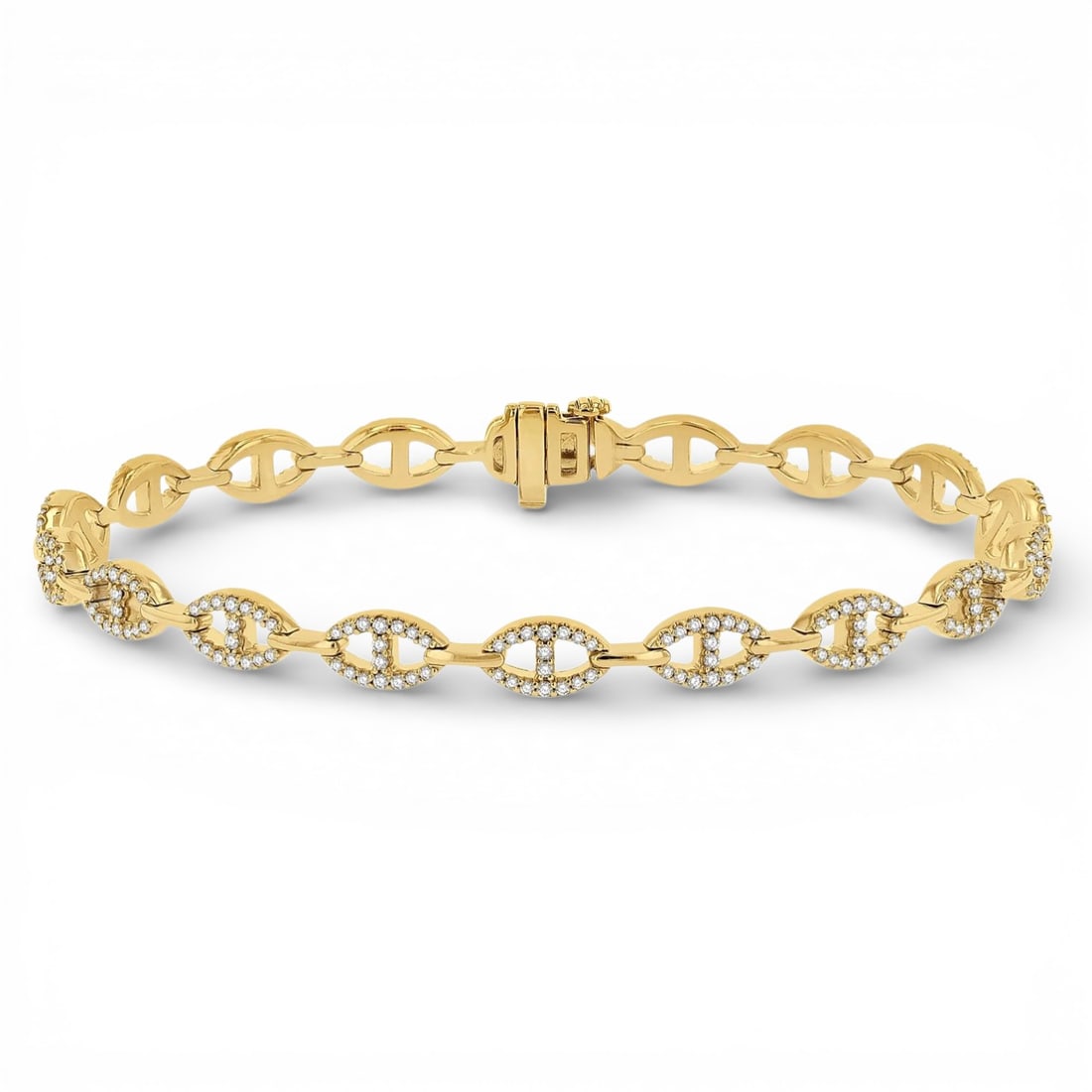 1.01 ctw Diamond Mariner Link 14K Yellow Gold Bracelet: Captured in a moment of brilliance, this stunning Mariner Link bracelet featuring Natural Diamonds speaks to the connoisseur. Securely held in a classic Pave design, the bracelet is forged from 11.95 