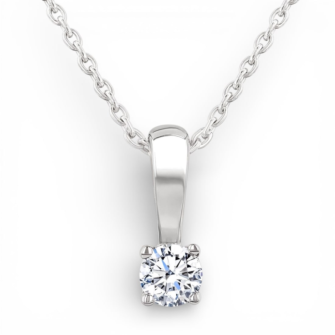 0.10 ctw Round White Diamond Solitaire Pendant 14K White Gold: A vision of luxury, this elegant Solitaire necklace featuring White Diamond defines sophistication. Expertly mounted in a Solitaire setting, the necklace is crafted in 0.33 g of solid 14K White Gold. 