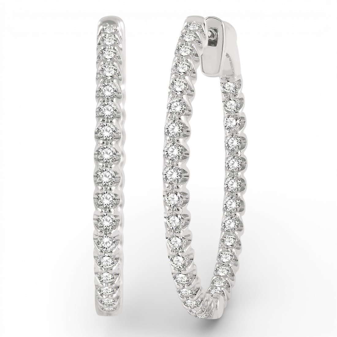 1.02 ctw White Diamond 14K White Gold Hoop Earrings: Timeless and sophisticated, this elegant Inside-Out Round Cut pair of earrings featuring White Diamonds radiates enduring beauty. The gemstones are nestled within a Continuous Line Hoop framework, sup