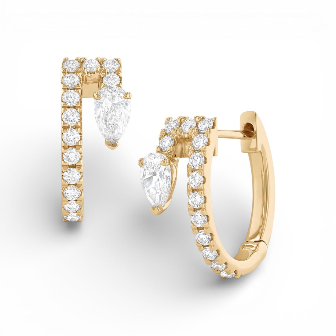 0.80 ctw Pear Diamond Paradox Hoop 18K Yellow Gold Earrings: Defining modern elegance, this stunning Paradox Pear Hoop pair of earrings featuring White Diamond captures the essence of style. Securely held in a classic Hoop design, the earrings are forged from 3