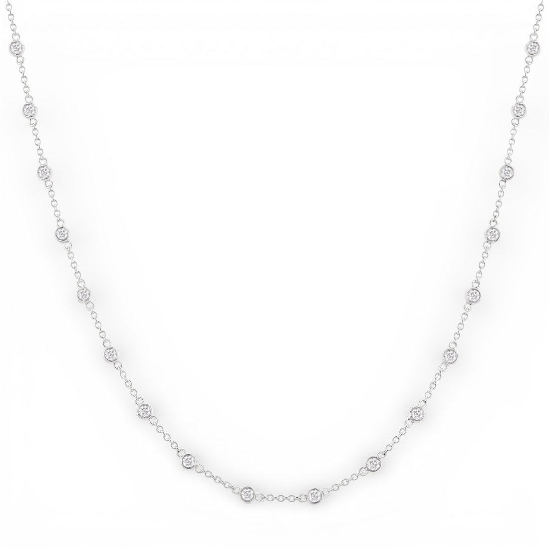 1.02 ctw Diamond Station 14K White Gold Necklace: Epitomizing grandeur, this breathtaking Station necklace featuring Natural Diamonds stands as a beacon of refined taste. Crafted with precision, the Bezel setting is seamlessly integrated into 3.65 gr