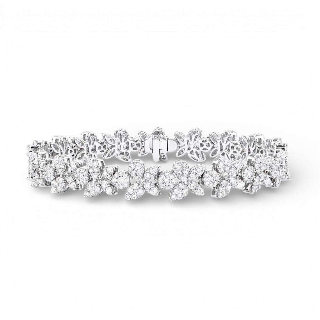 4.77 ctw White Diamond Floral Cluster 18K White Gold Bracelet: A testament to superior craftsmanship, this exquisite Floral Cluster bracelet featuring White Diamond is unparalleled. A detailed Cluster gallery secures the stones, rendered in 18.35 grams of lustrou