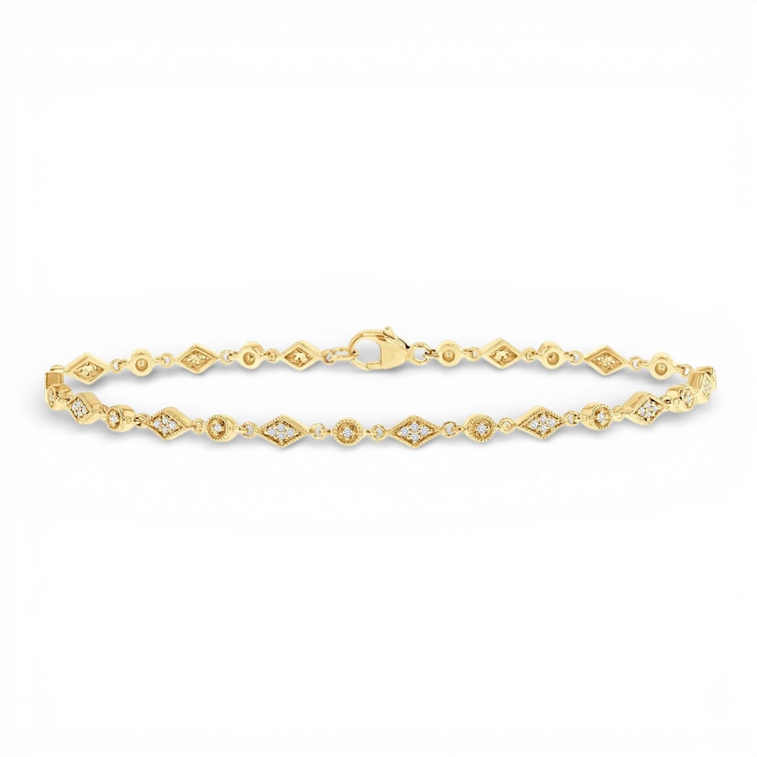 0.25 ctw Diamond Art Deco Kite 10K Yellow Gold Tennis Bracelet: Captured in a moment of brilliance, this exquisite Art Deco Kite bracelet featuring White Diamond speaks to the connoisseur. Securely held in a classic Link/Line design, the bracelet is forged from 4.